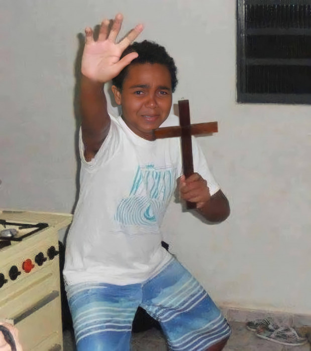 kid with a cross.jpg