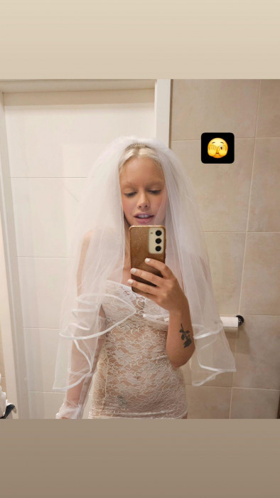 vivian lola - bride in the bathroom - ig photo.jpg