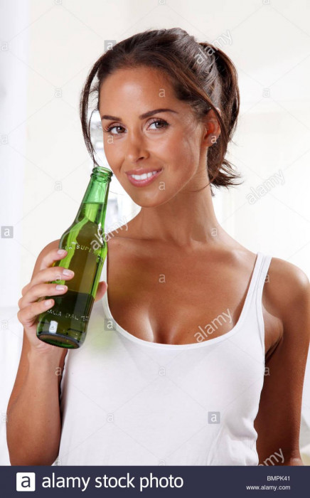 woman-holding-bottle-of-beer-BMPK41.jpg