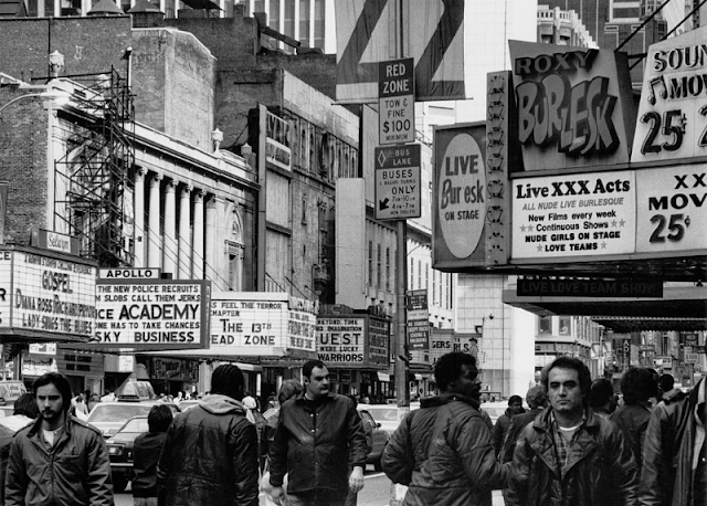 Cinemas and burlesque theatres on 42nd Street, New York City, circa 1984. Photo by Andreas Feininger.png